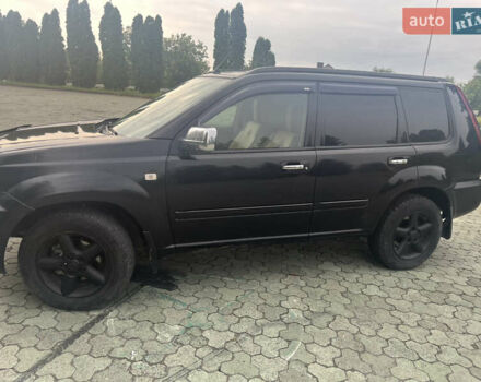 Черный Ниссан ИксТрейл, объемом двигателя 2.2 л и пробегом 356 тыс. км за 6000 $, фото 2 на Automoto.ua