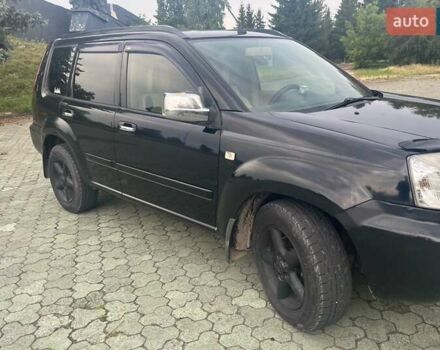 Черный Ниссан ИксТрейл, объемом двигателя 2.2 л и пробегом 356 тыс. км за 6000 $, фото 4 на Automoto.ua