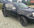 Черный Ниссан ИксТрейл, объемом двигателя 2.2 л и пробегом 356 тыс. км за 6000 $, фото 4 на Automoto.ua