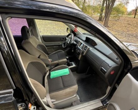 Черный Ниссан ИксТрейл, объемом двигателя 2.2 л и пробегом 275 тыс. км за 3000 $, фото 8 на Automoto.ua