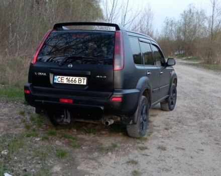 Черный Ниссан ИксТрейл, объемом двигателя 2 л и пробегом 380 тыс. км за 6500 $, фото 4 на Automoto.ua