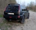 Черный Ниссан ИксТрейл, объемом двигателя 2 л и пробегом 380 тыс. км за 6500 $, фото 4 на Automoto.ua
