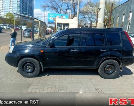 Черный Ниссан ИксТрейл, объемом двигателя 2.2 л и пробегом 333 тыс. км за 6500 $, фото 3 на Automoto.ua