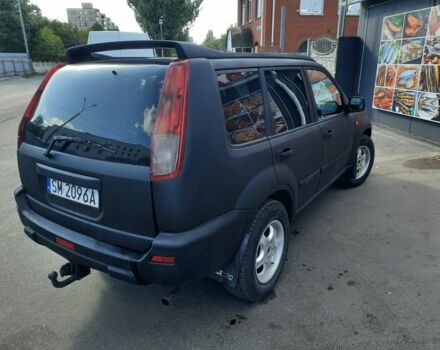 Черный Ниссан ИксТрейл, объемом двигателя 2.2 л и пробегом 280 тыс. км за 3000 $, фото 2 на Automoto.ua