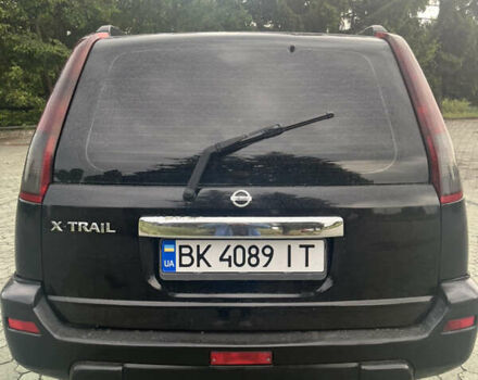 Черный Ниссан ИксТрейл, объемом двигателя 2.2 л и пробегом 356 тыс. км за 6000 $, фото 6 на Automoto.ua
