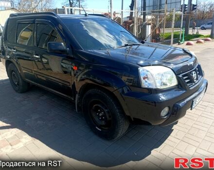 Черный Ниссан ИксТрейл, объемом двигателя 2.2 л и пробегом 333 тыс. км за 6500 $, фото 2 на Automoto.ua