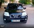 Черный Ниссан ИксТрейл, объемом двигателя 2 л и пробегом 250 тыс. км за 6300 $, фото 1 на Automoto.ua