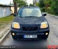 Черный Ниссан ИксТрейл, объемом двигателя 2 л и пробегом 300 тыс. км за 2550 $, фото 1 на Automoto.ua