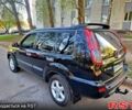 Черный Ниссан ИксТрейл, объемом двигателя 2.2 л и пробегом 257 тыс. км за 6500 $, фото 4 на Automoto.ua