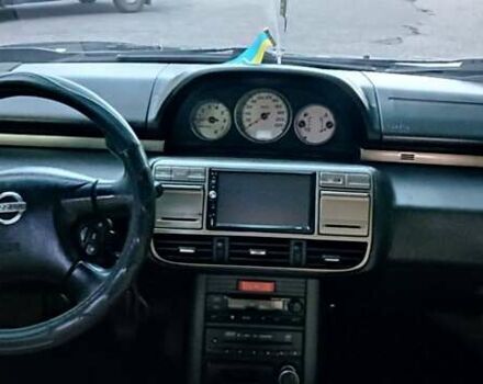 Черный Ниссан ИксТрейл, объемом двигателя 2 л и пробегом 300 тыс. км за 6300 $, фото 15 на Automoto.ua