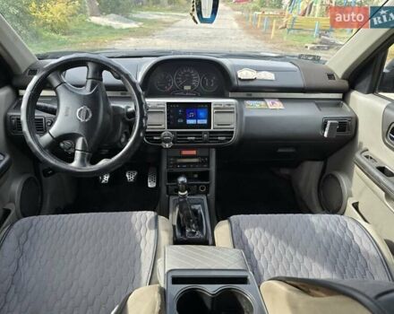 Черный Ниссан ИксТрейл, объемом двигателя 2.2 л и пробегом 300 тыс. км за 3300 $, фото 7 на Automoto.ua