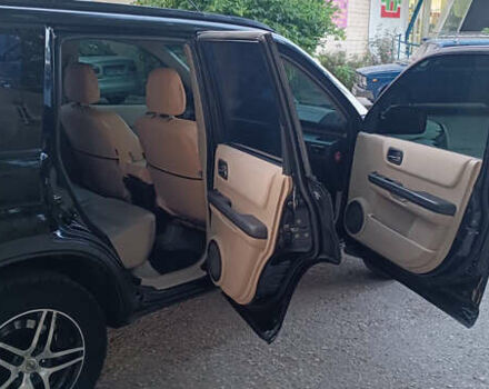 Черный Ниссан ИксТрейл, объемом двигателя 2 л и пробегом 300 тыс. км за 5500 $, фото 12 на Automoto.ua