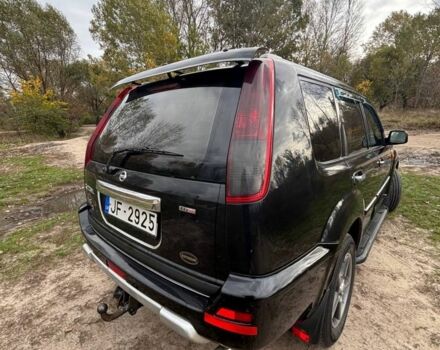 Черный Ниссан ИксТрейл, объемом двигателя 2.2 л и пробегом 300 тыс. км за 4000 $, фото 5 на Automoto.ua