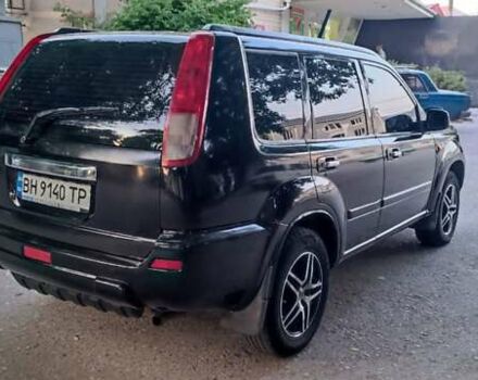 Черный Ниссан ИксТрейл, объемом двигателя 2 л и пробегом 300 тыс. км за 6300 $, фото 4 на Automoto.ua