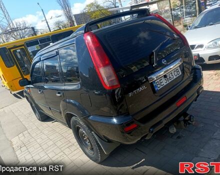 Черный Ниссан ИксТрейл, объемом двигателя 2.2 л и пробегом 333 тыс. км за 6500 $, фото 6 на Automoto.ua