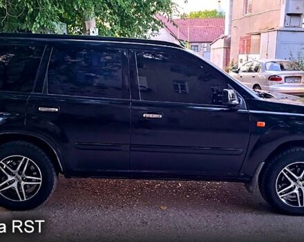 Черный Ниссан ИксТрейл, объемом двигателя 2 л и пробегом 257 тыс. км за 5800 $, фото 3 на Automoto.ua