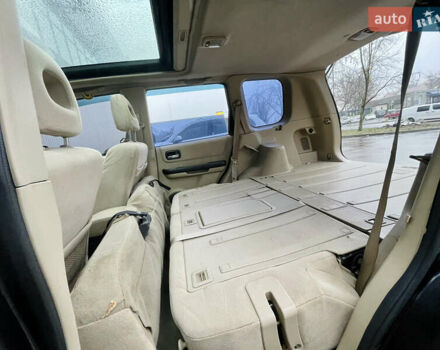 Черный Ниссан ИксТрейл, объемом двигателя 2 л и пробегом 320 тыс. км за 5600 $, фото 16 на Automoto.ua