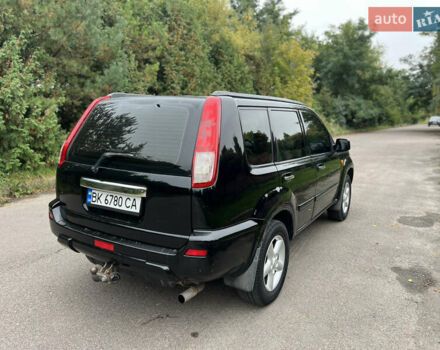 Черный Ниссан ИксТрейл, объемом двигателя 2 л и пробегом 260 тыс. км за 5300 $, фото 21 на Automoto.ua