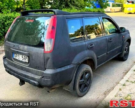 Черный Ниссан ИксТрейл, объемом двигателя 2 л и пробегом 300 тыс. км за 2550 $, фото 3 на Automoto.ua