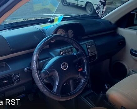 Черный Ниссан ИксТрейл, объемом двигателя 2 л и пробегом 257 тыс. км за 5800 $, фото 7 на Automoto.ua