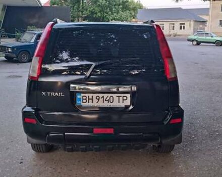 Черный Ниссан ИксТрейл, объемом двигателя 2 л и пробегом 300 тыс. км за 6300 $, фото 5 на Automoto.ua