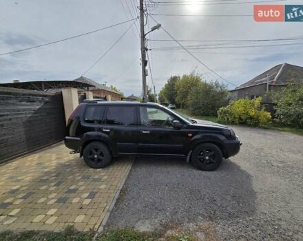 Черный Ниссан ИксТрейл, объемом двигателя 2.2 л и пробегом 300 тыс. км за 3300 $, фото 12 на Automoto.ua