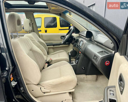 Черный Ниссан ИксТрейл, объемом двигателя 2 л и пробегом 320 тыс. км за 5600 $, фото 5 на Automoto.ua