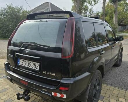 Черный Ниссан ИксТрейл, объемом двигателя 2.2 л и пробегом 300 тыс. км за 3300 $, фото 5 на Automoto.ua