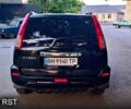 Черный Ниссан ИксТрейл, объемом двигателя 2 л и пробегом 257 тыс. км за 5800 $, фото 4 на Automoto.ua