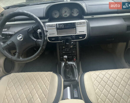 Черный Ниссан ИксТрейл, объемом двигателя 2.2 л и пробегом 356 тыс. км за 6000 $, фото 1 на Automoto.ua