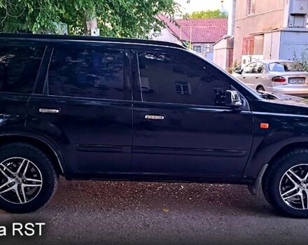 Черный Ниссан ИксТрейл, объемом двигателя 2 л и пробегом 250 тыс. км за 6300 $, фото 2 на Automoto.ua