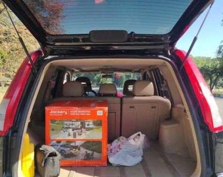 Черный Ниссан ИксТрейл, объемом двигателя 2 л и пробегом 227 тыс. км за 5200 $, фото 7 на Automoto.ua