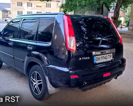 Черный Ниссан ИксТрейл, объемом двигателя 2 л и пробегом 257 тыс. км за 5800 $, фото 6 на Automoto.ua