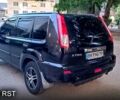 Черный Ниссан ИксТрейл, объемом двигателя 2 л и пробегом 257 тыс. км за 5800 $, фото 6 на Automoto.ua