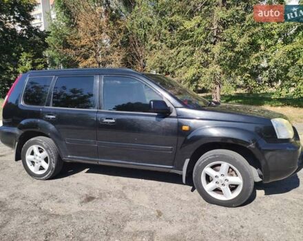 Черный Ниссан ИксТрейл, объемом двигателя 2 л и пробегом 227 тыс. км за 5200 $, фото 9 на Automoto.ua