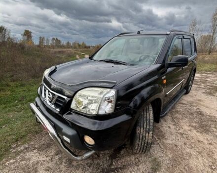 Черный Ниссан ИксТрейл, объемом двигателя 2.2 л и пробегом 300 тыс. км за 4000 $, фото 1 на Automoto.ua