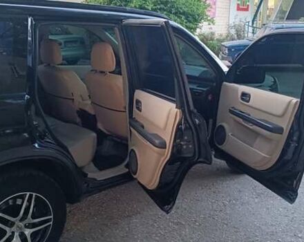 Черный Ниссан ИксТрейл, объемом двигателя 2 л и пробегом 300 тыс. км за 6300 $, фото 16 на Automoto.ua