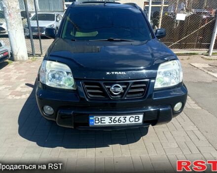 Черный Ниссан ИксТрейл, объемом двигателя 2.2 л и пробегом 333 тыс. км за 6500 $, фото 1 на Automoto.ua