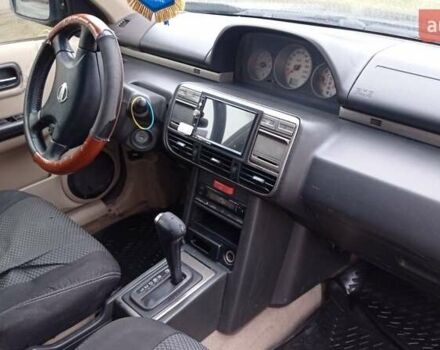 Черный Ниссан ИксТрейл, объемом двигателя 2 л и пробегом 265 тыс. км за 6700 $, фото 15 на Automoto.ua
