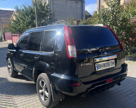 Черный Ниссан ИксТрейл, объемом двигателя 2.49 л и пробегом 176 тыс. км за 7800 $, фото 12 на Automoto.ua