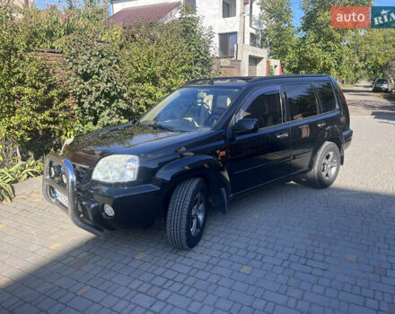 Черный Ниссан ИксТрейл, объемом двигателя 2.49 л и пробегом 176 тыс. км за 7800 $, фото 1 на Automoto.ua