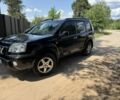 Черный Ниссан ИксТрейл, объемом двигателя 2 л и пробегом 277 тыс. км за 5800 $, фото 1 на Automoto.ua