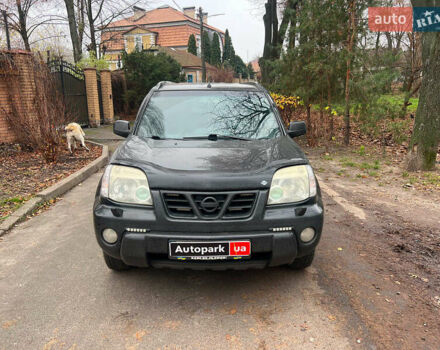 Черный Ниссан ИксТрейл, объемом двигателя 2 л и пробегом 215 тыс. км за 6490 $, фото 1 на Automoto.ua