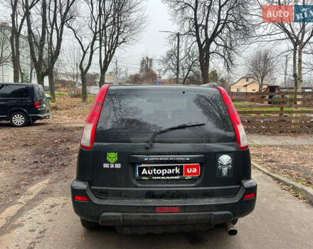 Черный Ниссан ИксТрейл, объемом двигателя 2 л и пробегом 215 тыс. км за 6490 $, фото 5 на Automoto.ua