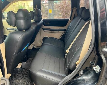 Черный Ниссан ИксТрейл, объемом двигателя 2 л и пробегом 215 тыс. км за 6490 $, фото 16 на Automoto.ua