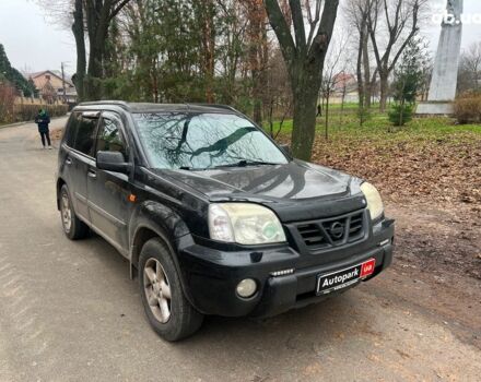 Чорний Ніссан ІксТрейл, об'ємом двигуна 2 л та пробігом 215 тис. км за 6490 $, фото 2 на Automoto.ua