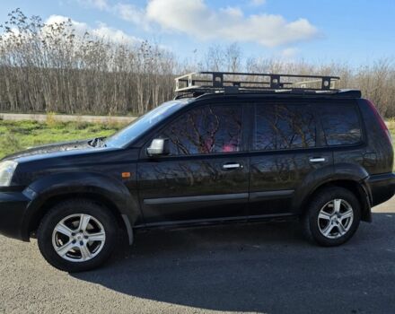 Черный Ниссан ИксТрейл, объемом двигателя 2 л и пробегом 365 тыс. км за 4023 $, фото 6 на Automoto.ua