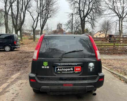 Чорний Ніссан ІксТрейл, об'ємом двигуна 2 л та пробігом 215 тис. км за 6490 $, фото 5 на Automoto.ua