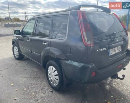 Черный Ниссан ИксТрейл, объемом двигателя 2.2 л и пробегом 308 тыс. км за 2800 $, фото 2 на Automoto.ua