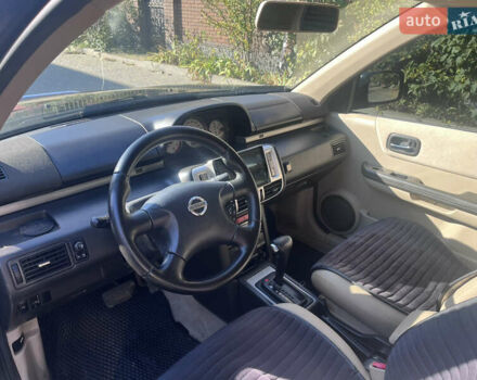 Черный Ниссан ИксТрейл, объемом двигателя 2.49 л и пробегом 176 тыс. км за 7800 $, фото 13 на Automoto.ua